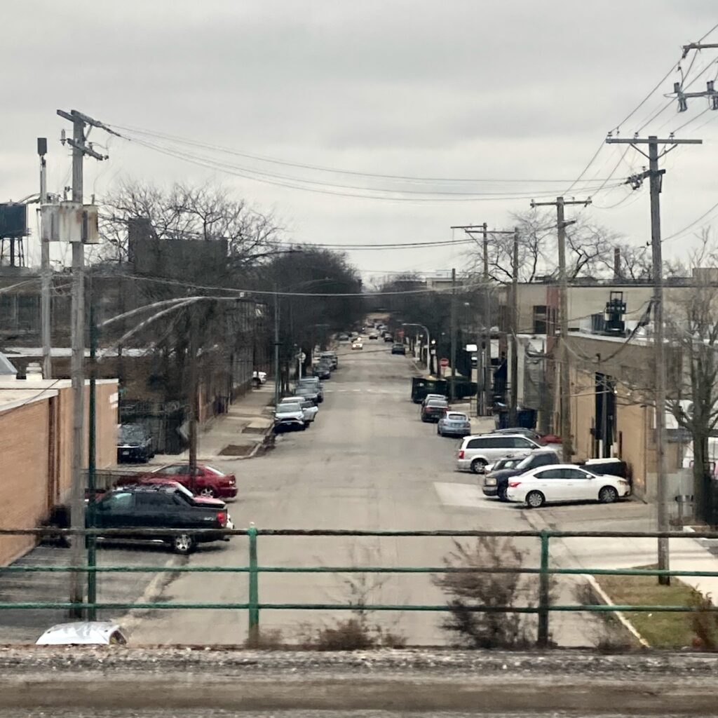 Looking down a Chicago street from the window of the train.