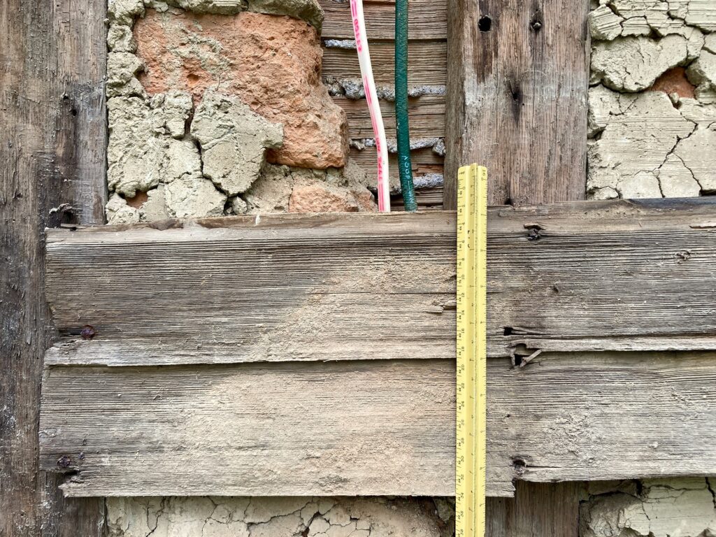 Close-up of clapboards with ruler to show size
