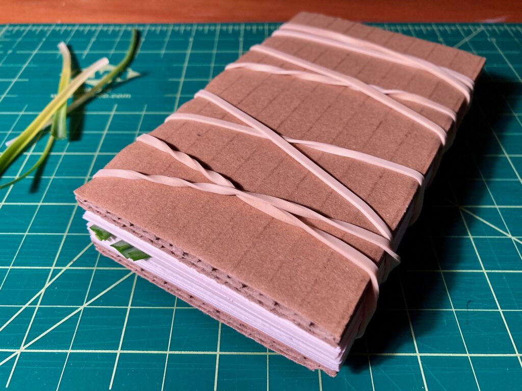 Side view of the assembled stack, showing the layers.